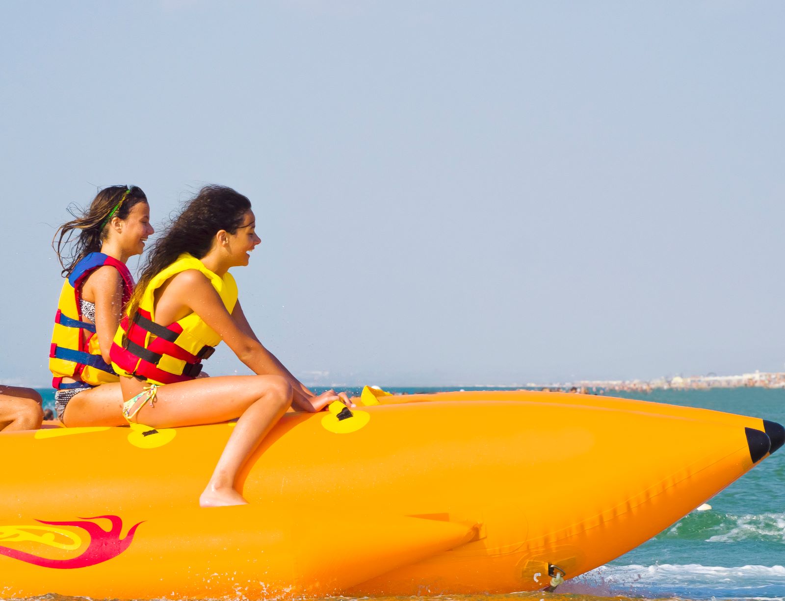 Two girls on banana boat in Anna Maria Island