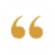 Gold decorative quotation marks used as a decorative accent